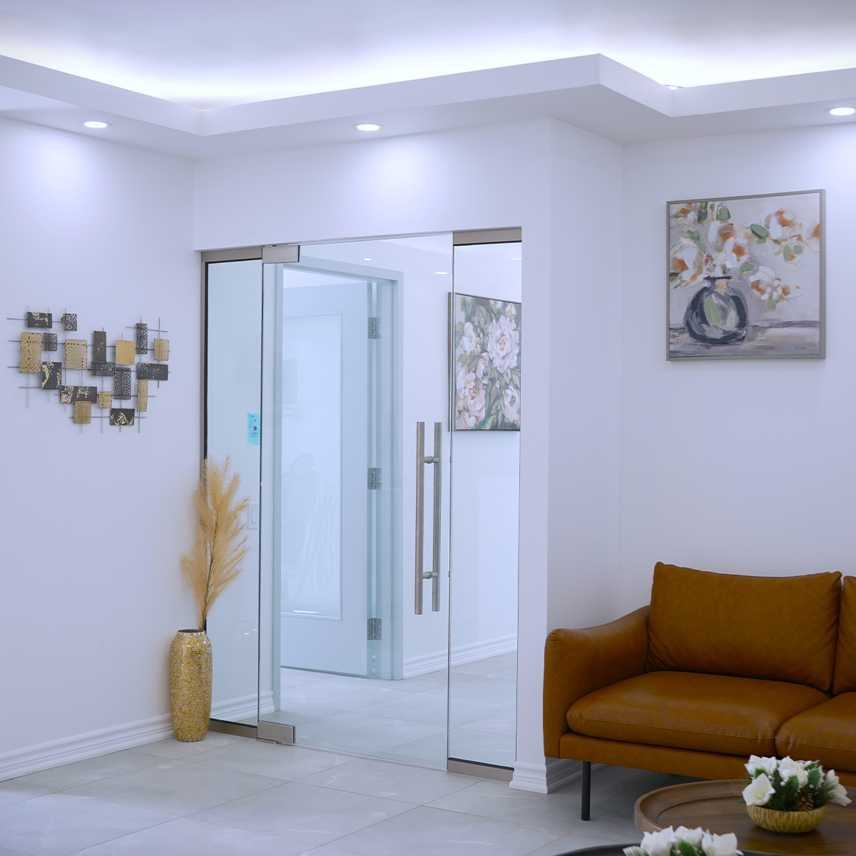 Glass entrance door and a lounge chair in the waiting area