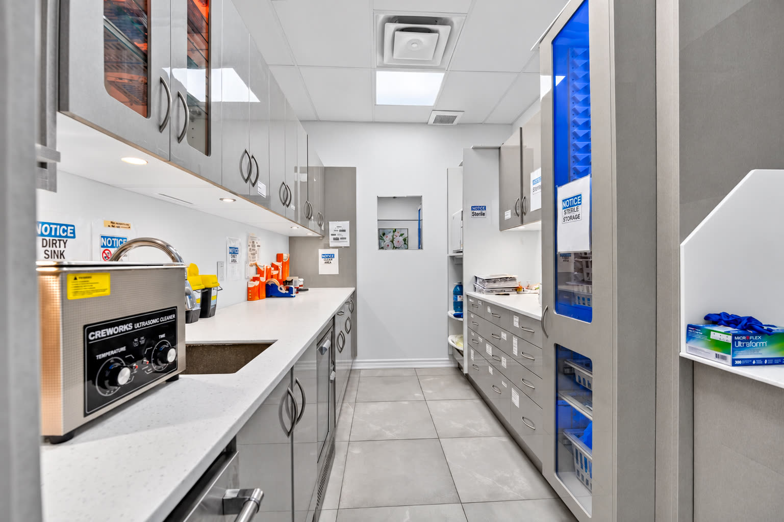 Instrument sterilization area with stainless-steel equipment and cabinets